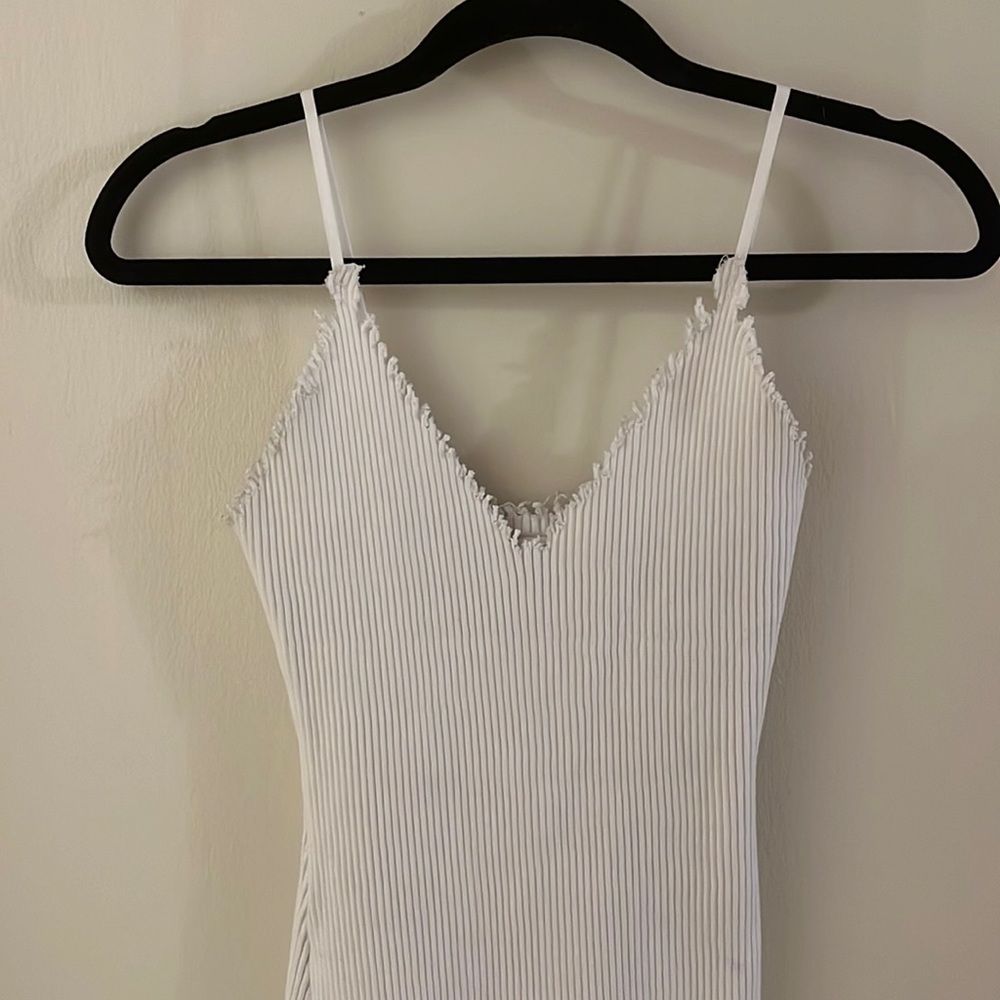 Tight fitting distressed mini dress